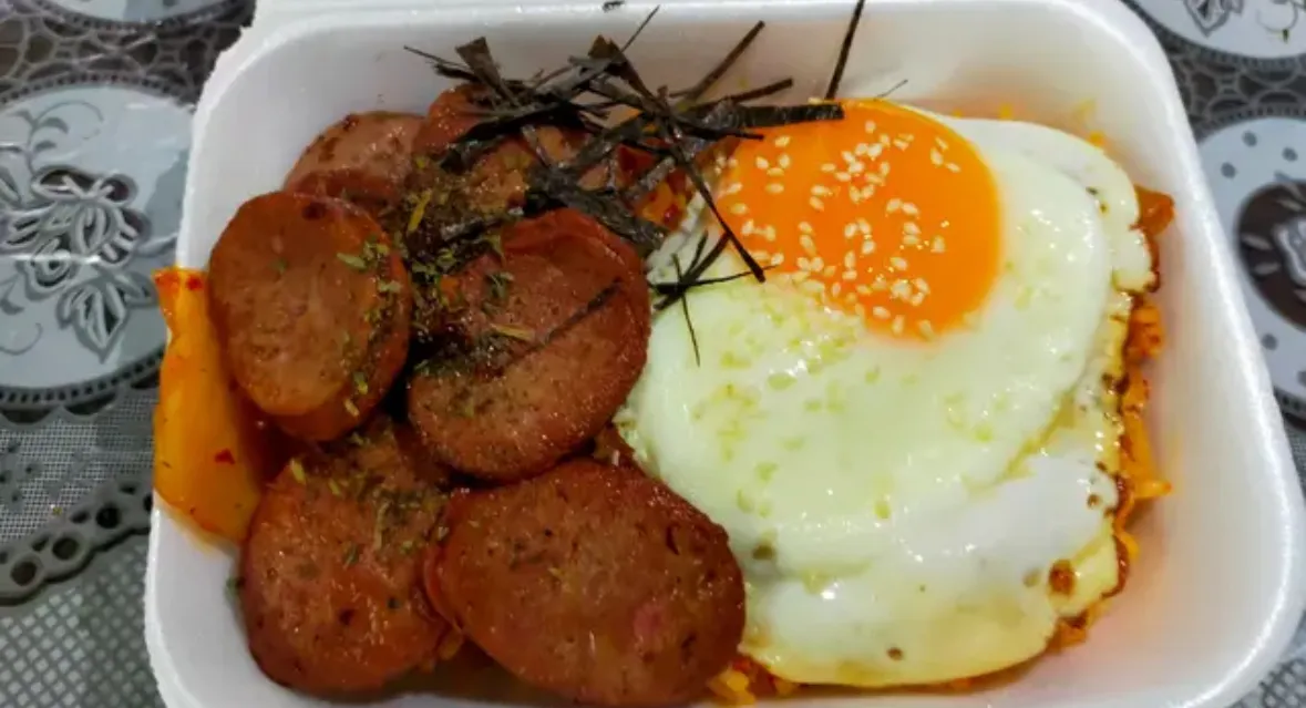 Kimchi fried rice with hungarian sausage and egg